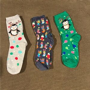 Three pair of women’s holiday socks.